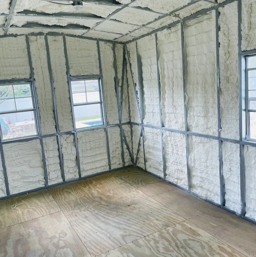Closed-cell spray foam insulation applied to wall cavities in a residential project in Franconia